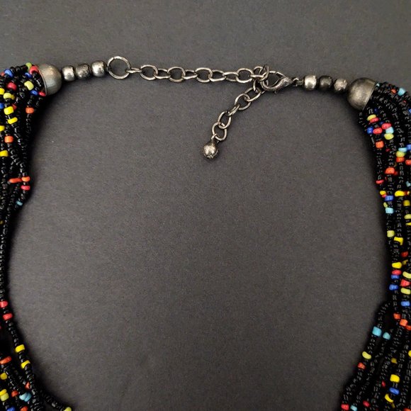Multi strand black seed bead necklace with bright bead accents - Picture 9 of 13